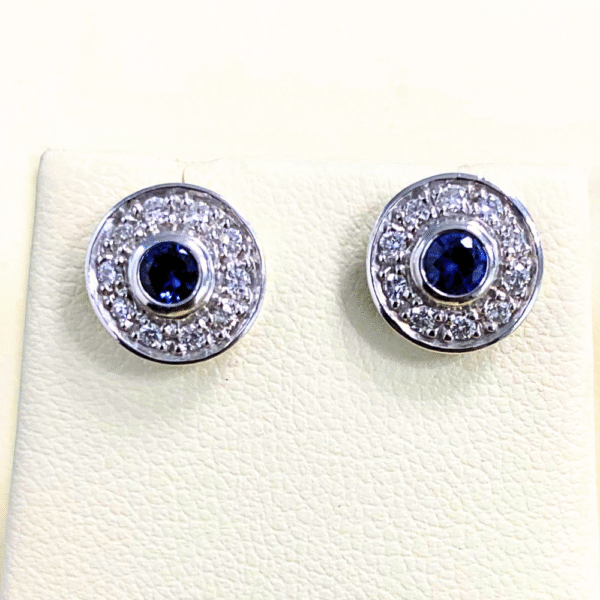 0.90 ct blue sapphire & 0.38 Ct diamond Studs in 18 k white gold studs