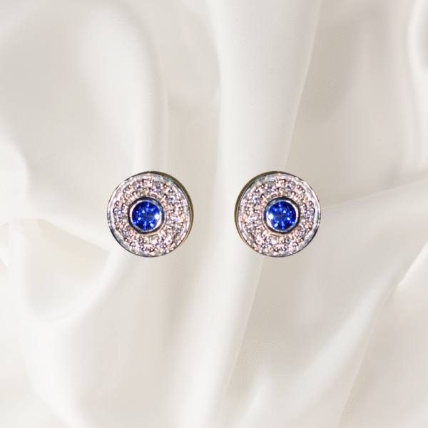 0.90 ct blue sapphire & 0.38 Ct diamond Studs in 18 k white gold studs