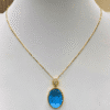 16.07 Ct Blue Topaz & 0.06 Ct Diamond Pendant in 18K Gold